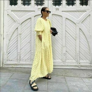 Bloggers fav yellow loose fitting textured dress